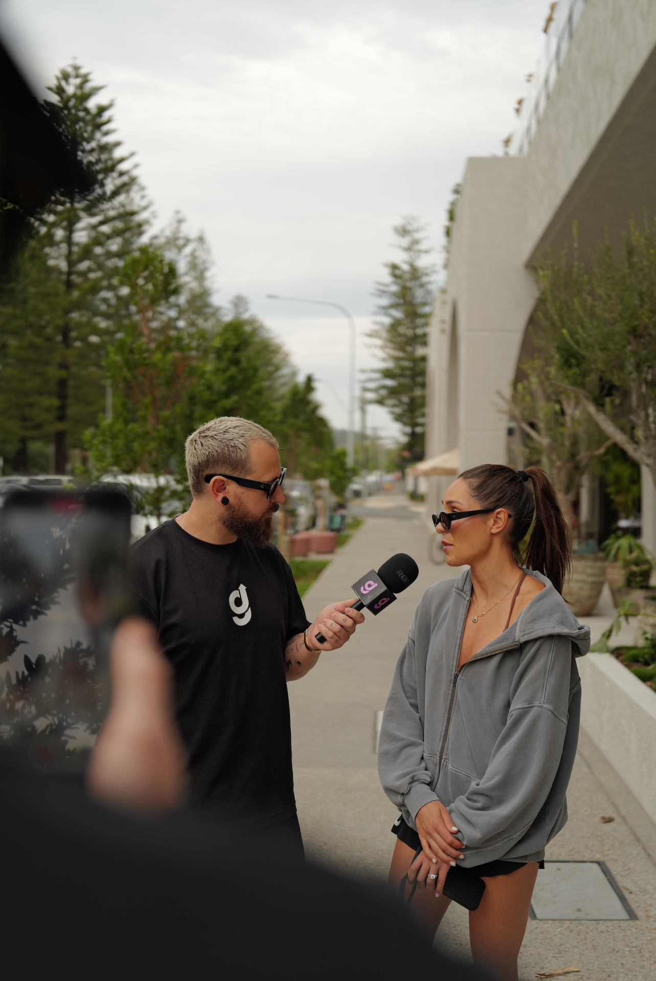 getahead reporter interviewing someone on the street